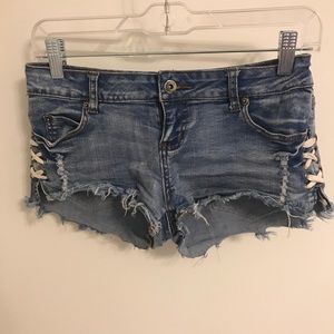 JEAN SHORTS WITH LACE UP DETAIL